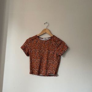 Used gaze cheetah print shirt size small could fit 9-12